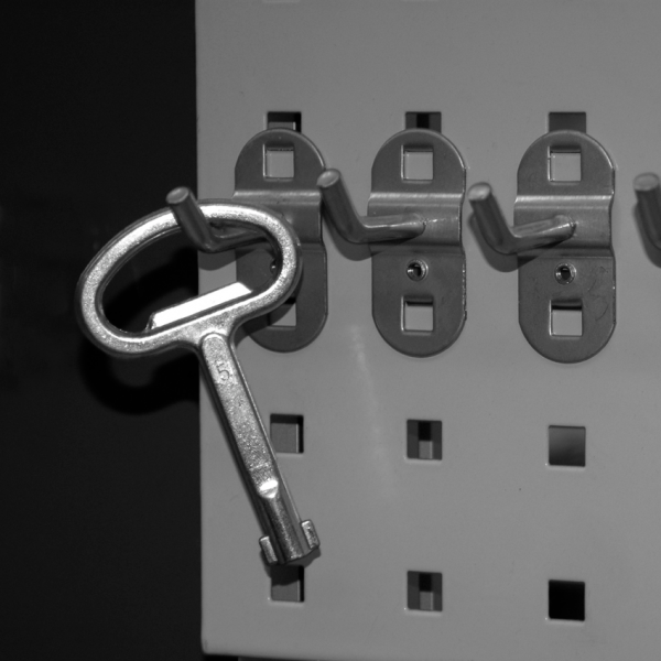 Tool holder with slanted hook ends